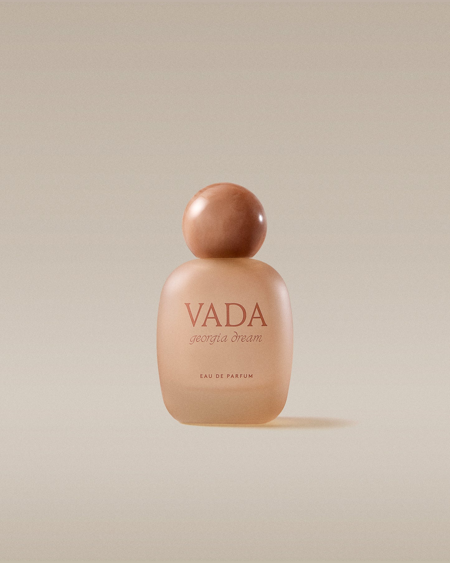 Vada perfume bottle on a beige background