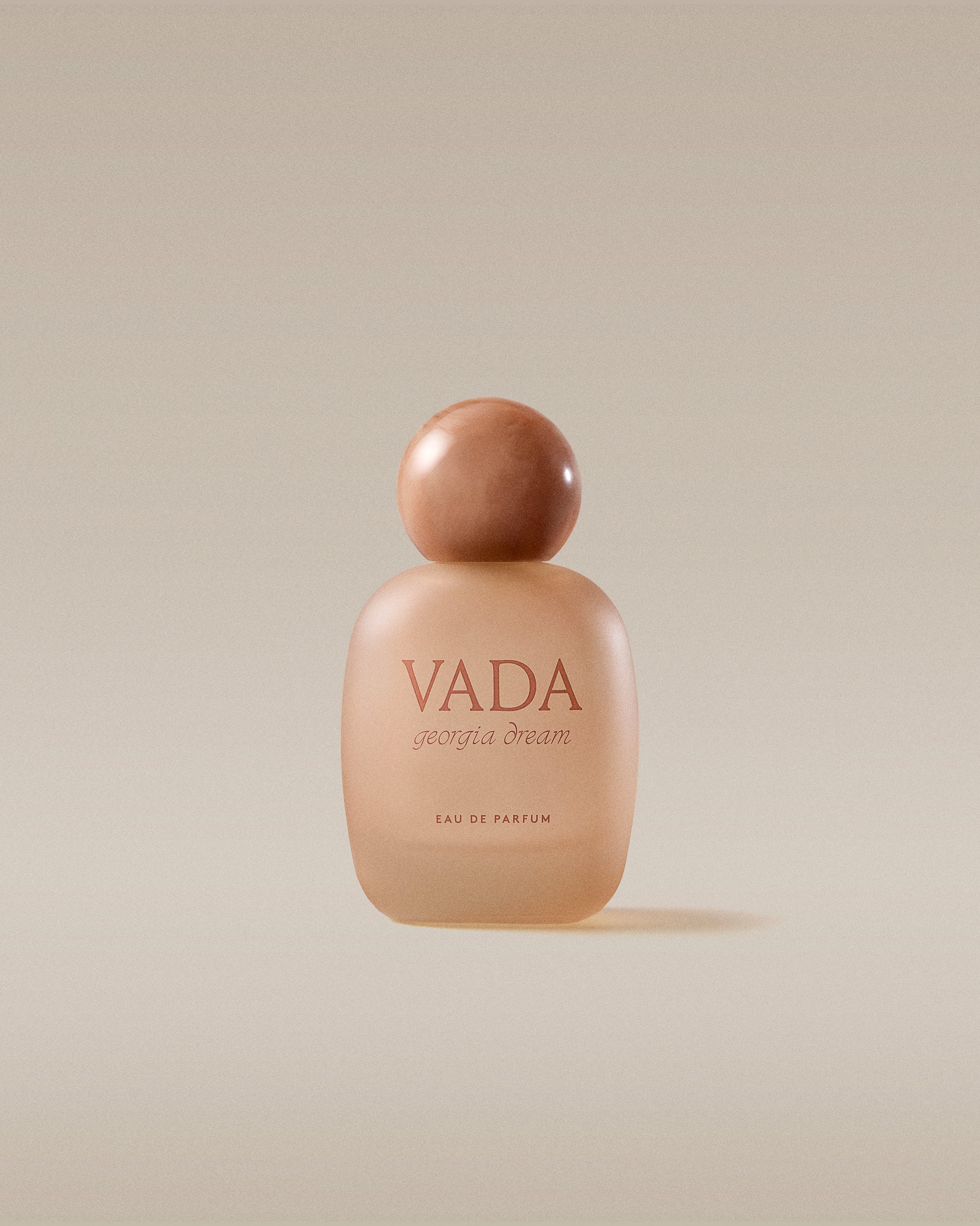 Vada perfume bottle on a beige background